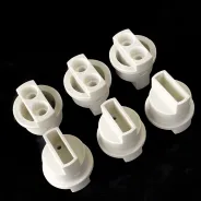 Pièces de moulage par injection